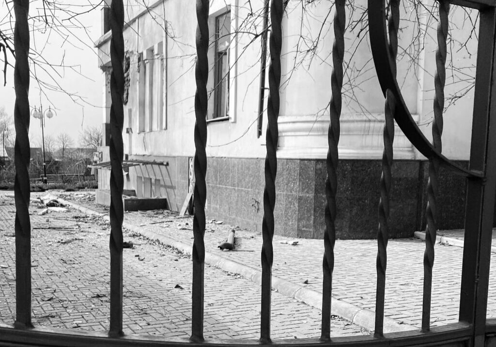 A black and white photo of an old building.