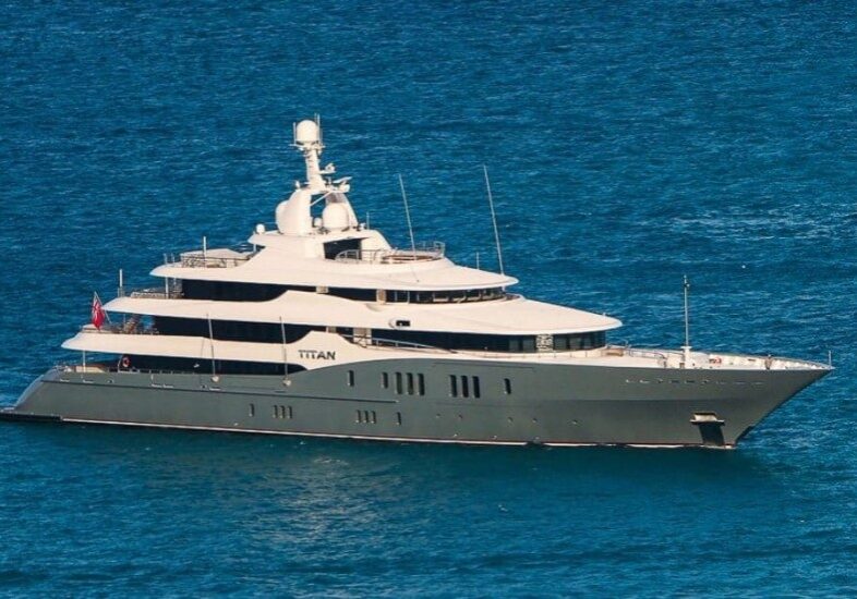 A large white boat floating on top of the ocean.