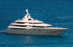 A large white boat floating on top of the ocean.